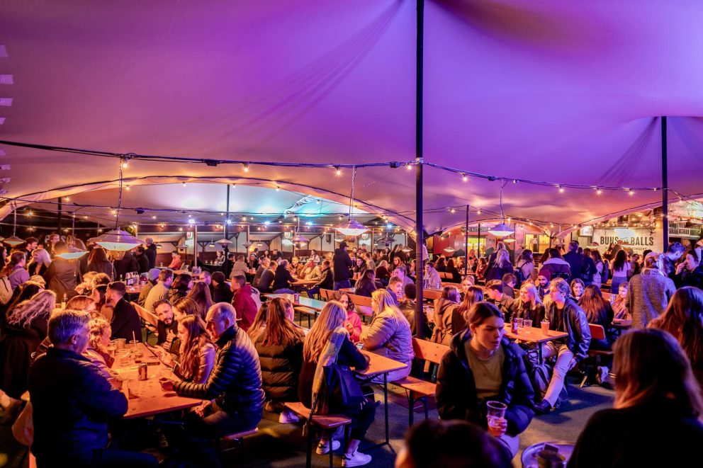 Crowds inside the Vinegar Yard stretch tent